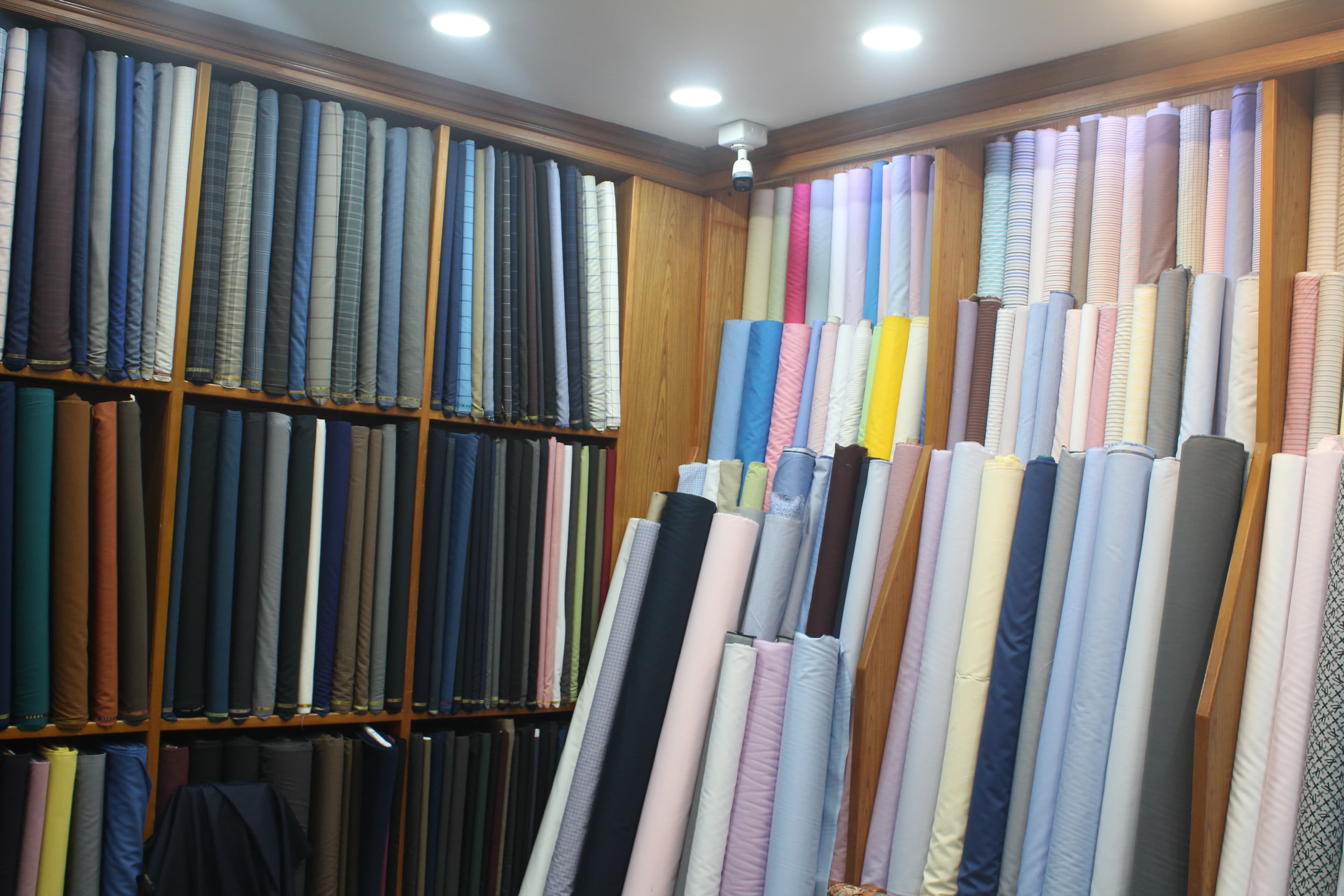 A rail of tailored jackets